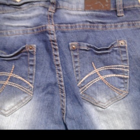 Středně modré rifle se šisováním Takko