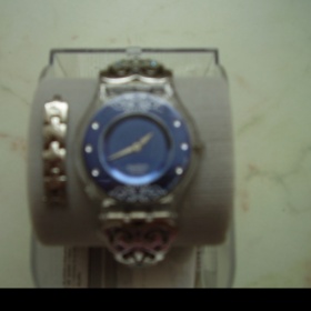 Dámské hodinky Swatch s modrým ciferníkem