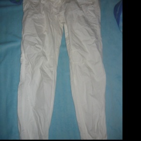 Bílé kalhoty s mašličkou - foto č. 1