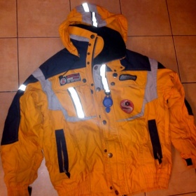 Teplá zimní bunda  oranžovo šedo modrá od  Atomic