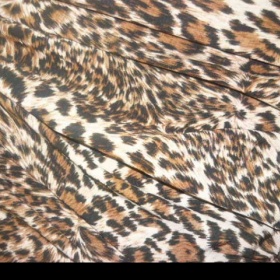 Minišaty s černými flitry leopardí barvy - foto č. 1