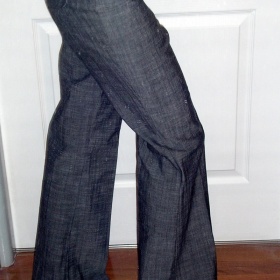 Šedé společenské kalhoty  širšího střihu  Orsay - foto č. 1