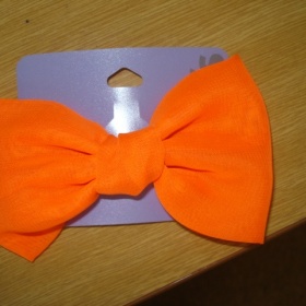 Neonově ranžová mašle do vlasů - sponka Claire´s