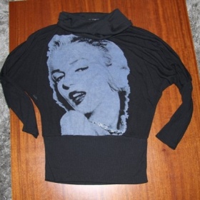 Černý topík s rolákem