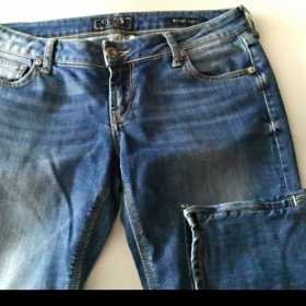 Modré rifle se zipy na nohavicích  Guess