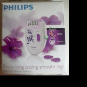 Bílo fialový depilátor Philips - foto č. 1