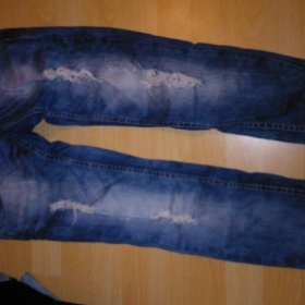 Modré roztrhané džíny neznačkové - foto č. 1