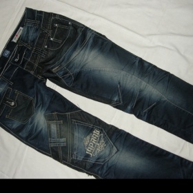 Tmavě modré  bokové jeansy Japrag - foto č. 1