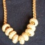 Zlatý náhrdelník s kamínky Opia - foto č. 2