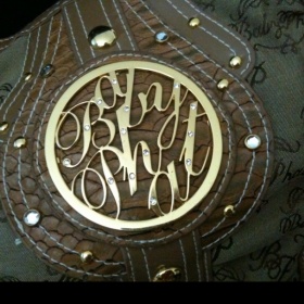 Hnědá kabelka značky Baby Phat